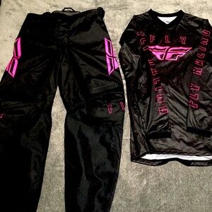 NWOT Fly racing womens size medium black/hot pink motocross outfit.